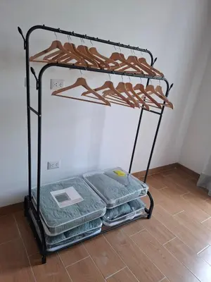 a metal bunk bed with towels on it at Condominio ecológico las gardenias de Asia