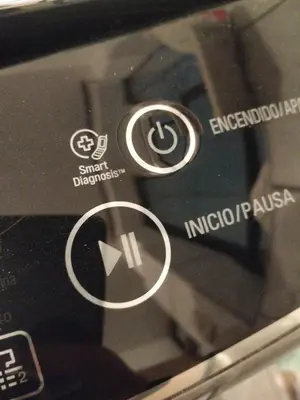 a close up of a cell phone with arrows on it at El Rosedal in Lima