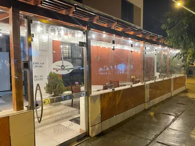 a store front with glass windows in a building at Miraflores Pacific Hotel in Lima