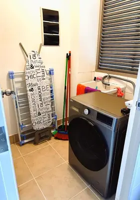 a laundry room with a washing machine in it at Departamento en Miraflores - Av Pardo Jose in Lima