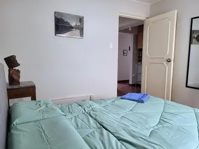 a bedroom with a large bed in a room at Entire Apartment in Miraflores in Lima