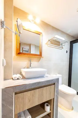a bathroom with a sink and a toilet at Intiflatscusco Comfortable Stay in the Heart of the City in Cusco