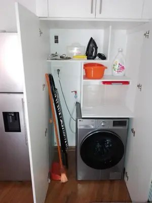 a laundry room with a washing machine in it at Miraflores, Lima, apartamento 2 dormitorios in Lima