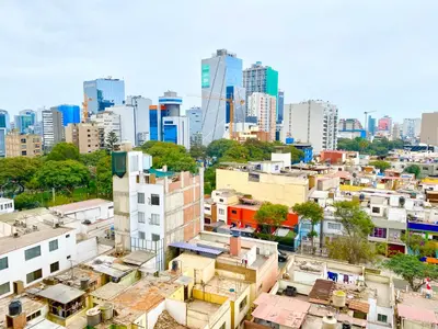 a view of a city with tall buildings at Apartamento exclusivo a un paso de San Isidro in Lima