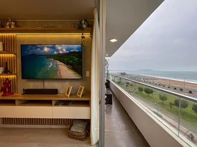 a room with a view of the beach and the ocean at Ocean Blue, Vista Frontal Al Mar in Lima