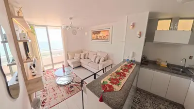 an aerial view of a living room with a couch at Ocean Blue, Vista Frontal Al Mar in Lima