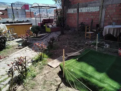 a garden with a miniature golf course in the yard at SOLGARDENs in Cusco
