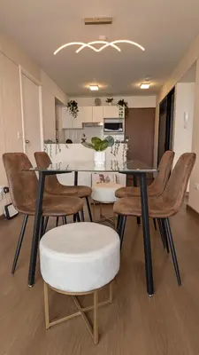 a dining room with a table and chairs at Descanso en Oscuridad Absoluta in Lima