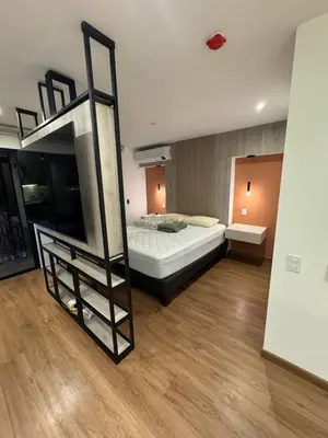 a bedroom with a bunk bed and a ladder at Miraflores La Mar in Lima