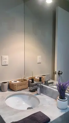a bathroom with a large sink and a mirror at Beautiful and spacious apartment in San Felipe in Lima