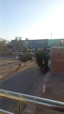 a view from a window of a parking lot at Casa Hamuys - Ica in Ica