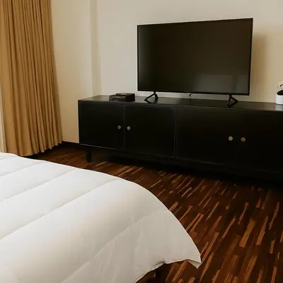 a bedroom with a flat screen television on a dresser at Bella vista al mar y Larcomar - Miraflores in Lima