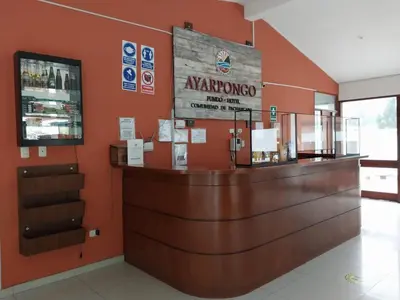 a bar in a pharmacy with a sign on the wall at Fundo Hotel Ayarpongo in Churín