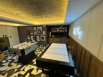 a room with a pool table and a ping pong ball at Premium apartment in Miraflores with rooftop pool in Lima