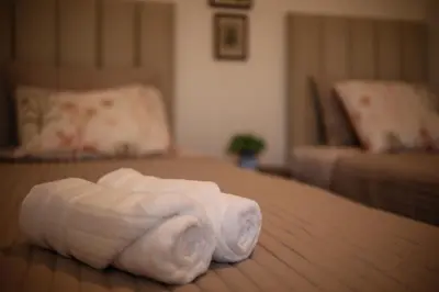 a group of rolled towels sitting on a floor at Brand new apartment in Olivar of San Felipe in Lima