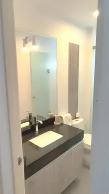 a bathroom with a sink and a large mirror at Apartment modern full 3BR near Larcomar, Miraflores, Lima, Peru Sunset all days in Lima