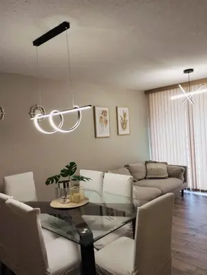 a living room with a couch and a table at Adriana in Lima
