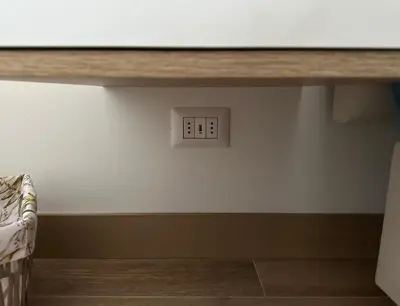 a lightswitch on a wall in a room at Elegant and cozy 2BR in Miraflores by Eco28 in Lima