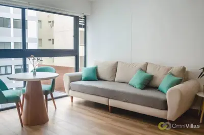 a living room with a couch and a table at Elegant and cozy 2BR in Miraflores by Eco28 in Lima