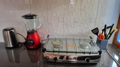 a blender sitting on top of a counter at Cottage in nature in Sacred Valley with mountain views in Huayllabamba