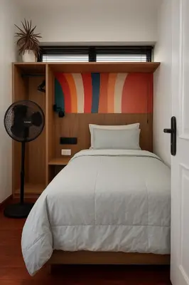 a bedroom with a bed with a colorful headboard at Mar Private Rooms in Lima