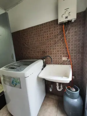 a bathroom with a toilet and a bath tub at Miraflores apartment near Larcomar in Lima