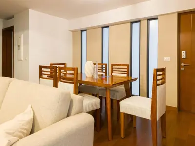 a dining room with a table and chairs at Meridian 3BR by Geko in Lima