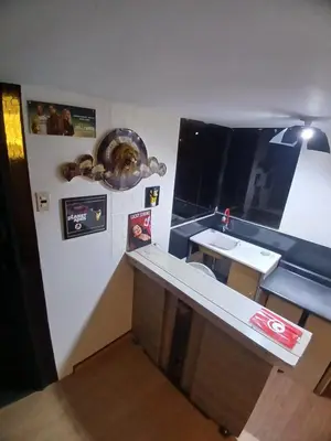 a kitchen with a counter and a sink in a room at Freestyle Home in Lima