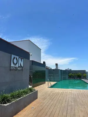 a swimming pool on the roof of a building at Casa viajera - orla los topacios in Lima