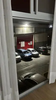 a view of cars parked in a parking lot at Casa viajera - orla los topacios in Lima