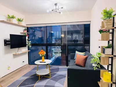 a living room with a couch and a table at Era 24 mala puntuacion in Lima