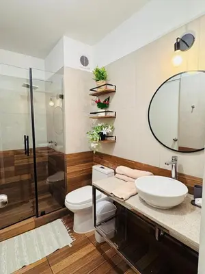 a bathroom with a toilet and a sink and a shower at Era 24 mala puntuacion in Lima