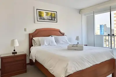 a bedroom with a bed with a box on it at Big 3BR Apartment in the center of Miraflores in Lima