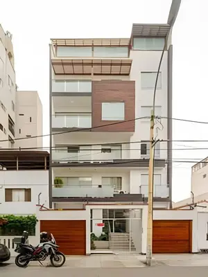 a motorcycle parked in front of a building at Exclusive Apartment in Miraflores in Lima