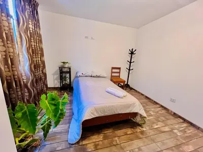 a bedroom with a bed in a room at Casa Cubo Deluxe in La Molina in Lima