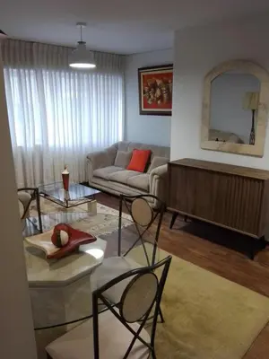 a living room with a couch and a table at Miraflores, Lima, apartamento 1 dormitorio in Lima