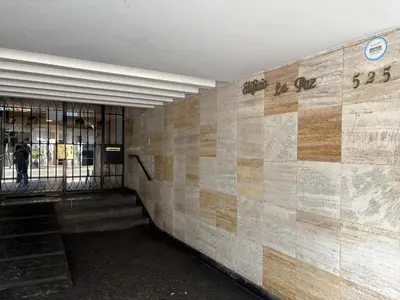 a building with a wall with writing on it at 2Br Apartment Miraflores in Lima