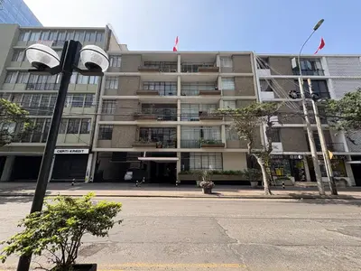 a building with a street light in front of it at 2Br Apartment Miraflores in Lima