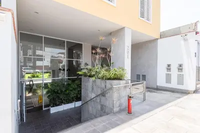 a building with a planter on the side of it at Duplex in the best area of Barranco in Lima