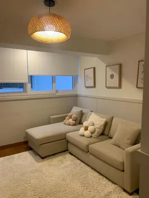 a living room with a couch with teddy bears on it at Spacious apartment in Miraflores in Lima