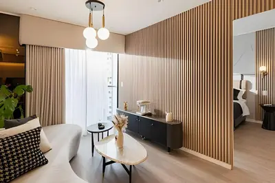 a living room with a couch and a table at Torre Black in Lima