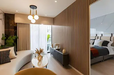 a bedroom with a king sized bed and a couch at Torre Black in Lima
