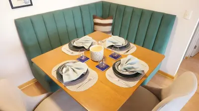 a wooden table with hats and plates on it at Cozy 2BR, Prime Barranco, 7th Flr in Lima