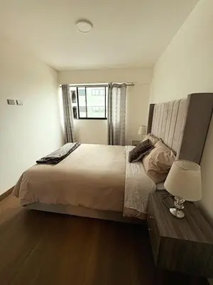 a bedroom with a large bed and a window at Charming San Isidro Stay in Lima