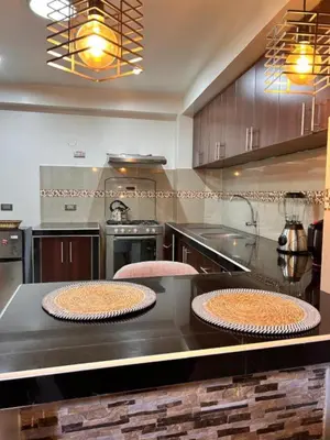 two pies sitting on a counter in a kitchen at Apartamento Lucky House Cusco in Cusco