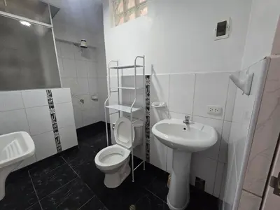 a bathroom with a toilet and a sink at 402G Modern equipped apartment in Abancay