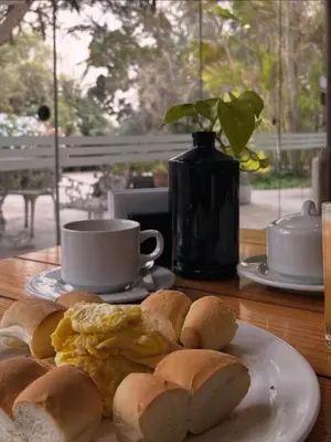 a plate of eggs and bread on a table at Rosa Estela in Cieneguilla