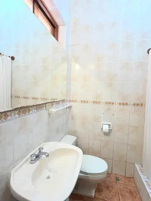a bathroom with a sink and a toilet at Rosa Estela in Cieneguilla