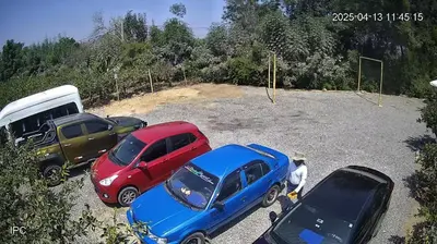 a group of cars parked in a parking lot at Mandarhemia Club in Huaral