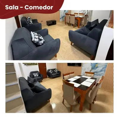 a living room with blue couches and a table at Departamentos Sumaq Plaza - Bellido in Ayacucho